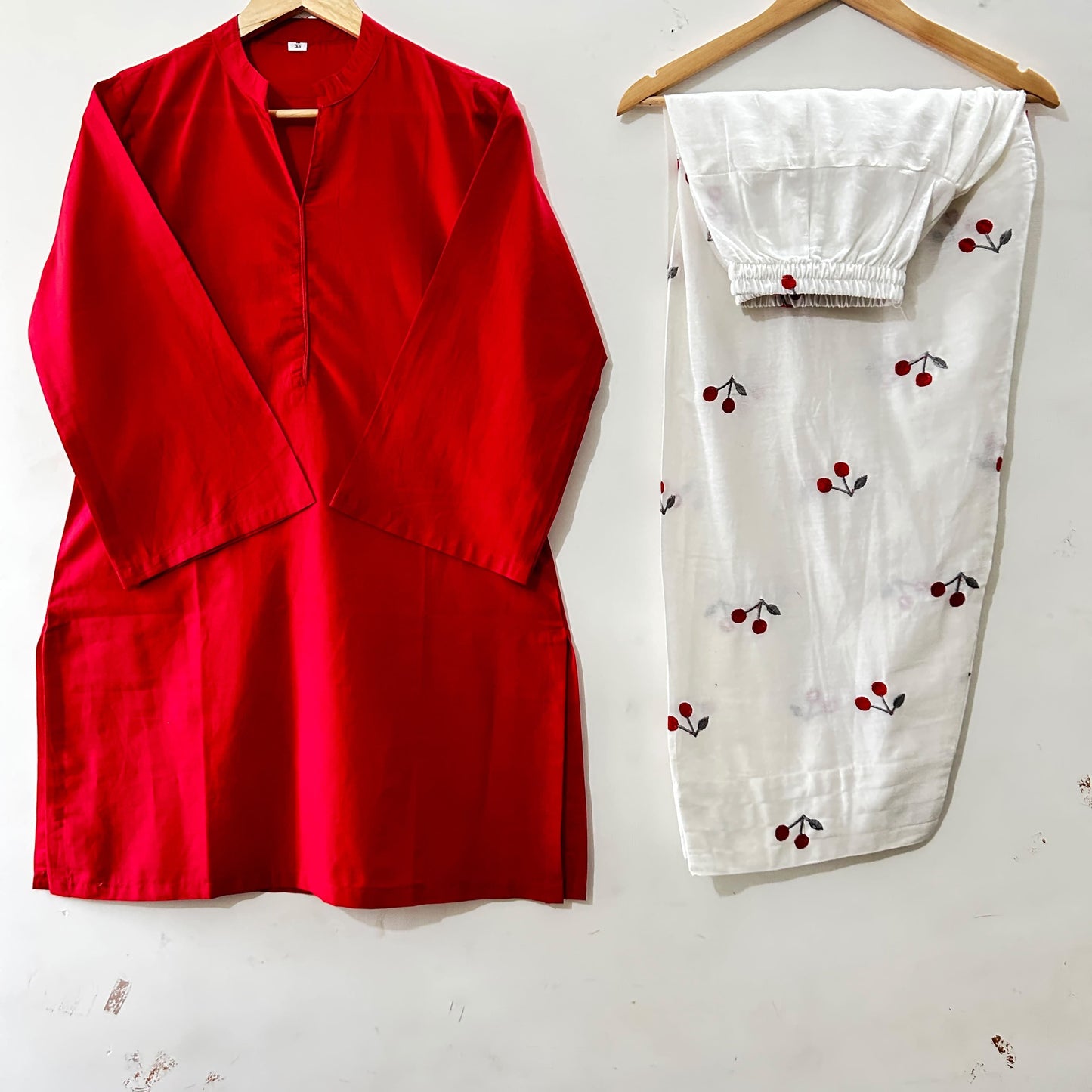 Classic Red Straight Kurti Paired with Embroidered Cherry-Motif Farshi Salwar Pants