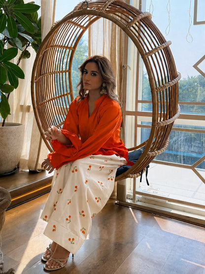 Tangelo Orange Solid Kurti Set with Cherry/Floral Embroidered Cream Wide-Leg Trousers