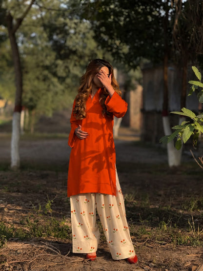 Tangelo Orange Solid Kurti Set with Cherry/Floral Embroidered Cream Wide-Leg Trousers