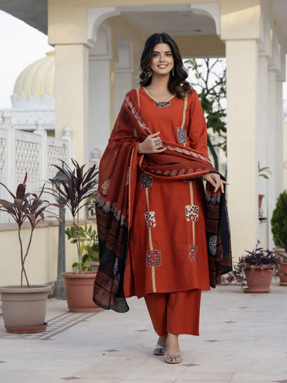 Classic Orange Kurta Set with Artistic Patch Detailing & Dupatta