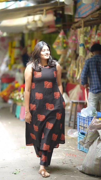 Heritage Parade: Black Sleeveless Kurta Set with Red Elephant Motifs