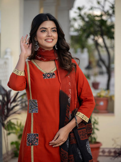 Classic Orange Kurta Set with Artistic Patch Detailing & Dupatta