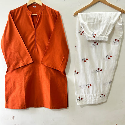 Tangelo Orange Solid Kurti Set with Cherry/Floral Embroidered Cream Wide-Leg Trousers