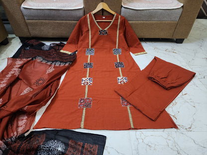 Classic Orange Kurta Set with Artistic Patch Detailing & Dupatta